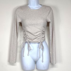 LeLis size small Cream Colored long sleeved rushed Cropped top
